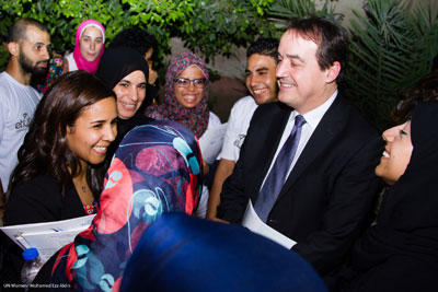 Yannick Glemarec, UN Women Deputy Executive Director for Policy and Programme, interacts with Youth Ambassadors for the Women's Citizenship Initiative and Safe Cities partners during his field visit to Imbaba in Cairo on 25 June. Photo: UN Women/Mohamed Ezz Aldin 