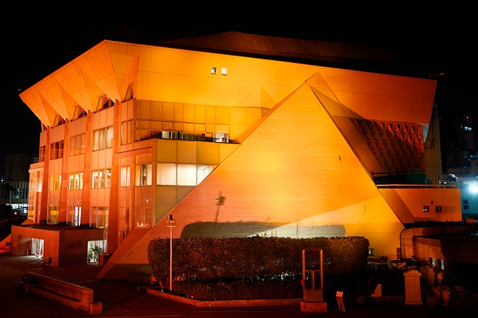 Lighting up Bibliotheca Alexandrina to mark the beginning of the 16 days of Activism